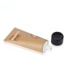 Paper cosmetic tube with black screw caps