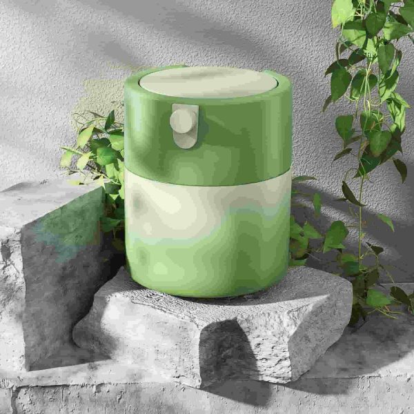 Green small fresh plastic cosmetic packaging cream bottle can be refilled