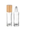 Luxury custom skincare products packaging hot sale empty clear essential oil glass bamboo perfume bottle with bamboo lid metal ball