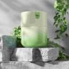 Green small fresh plastic cosmetic packaging cream bottle can be refilled